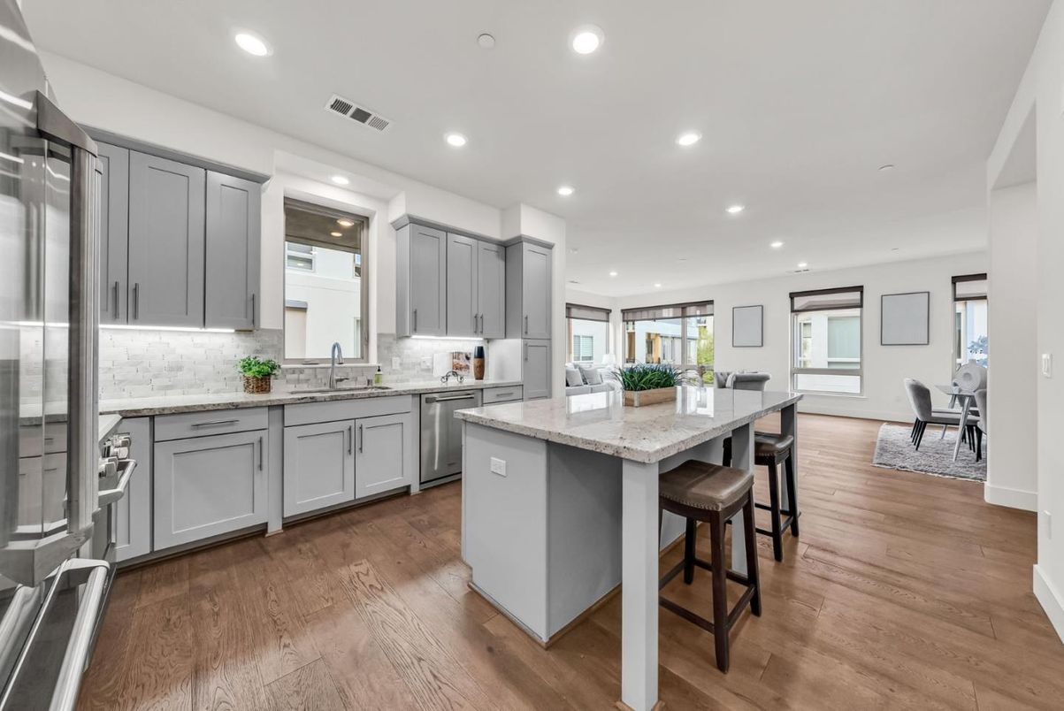 Dining room, Interior, Kitchen, Recessed Lighting, Stainless Steel Appliances, Wood Texture Flooring