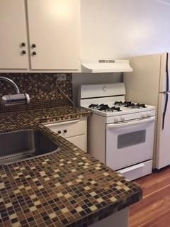 Interior, Kitchen, Tile Countertops, Wood Texture Flooring