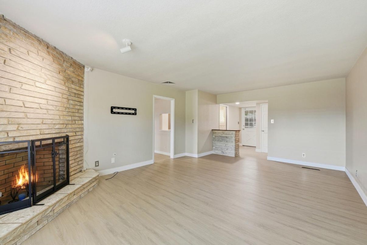 Empty room, Fireplace, Interior, Stone Walls, Wood Texture Flooring