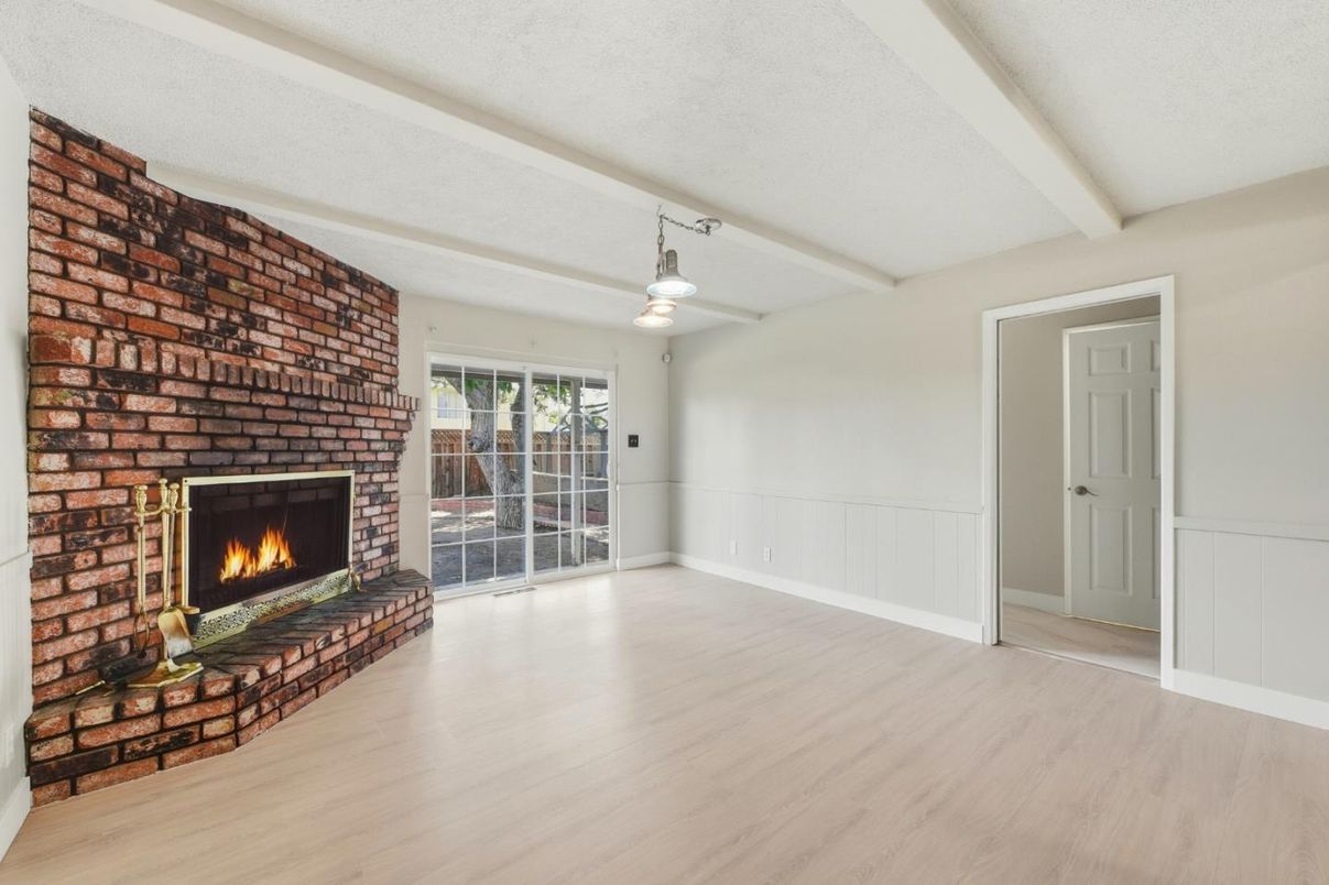 Empty room, Fireplace, Interior, Pendant Lights, Stone Walls, Wood Texture Flooring