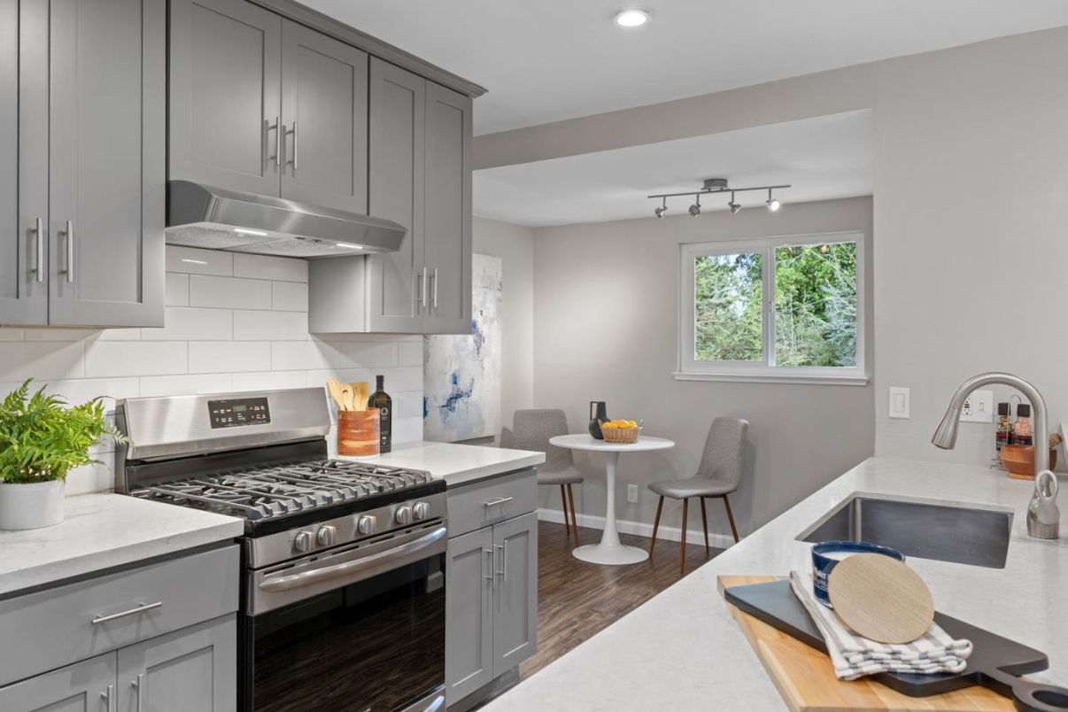 Dining room, Interior, Kitchen, Recessed Lighting, Stainless Steel Appliances, Wood Texture Flooring