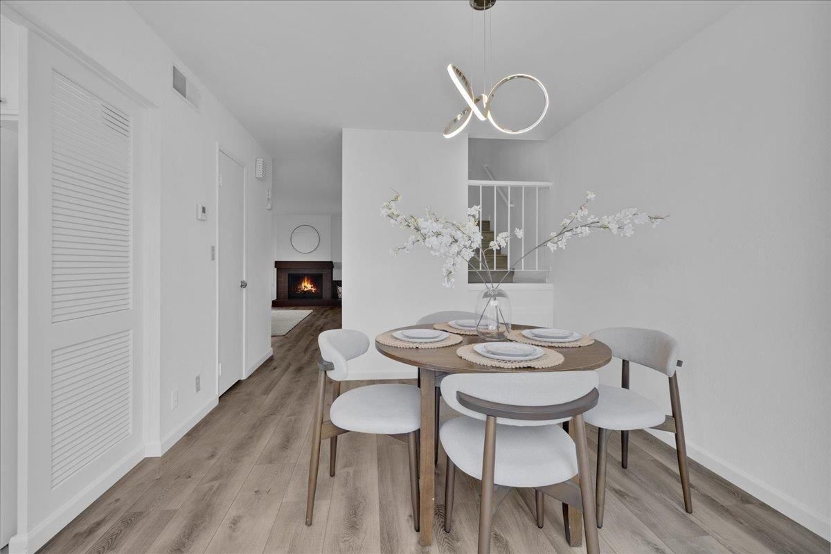 Dining room, Fireplace, Interior, Pendant Lights, Wood Texture Flooring