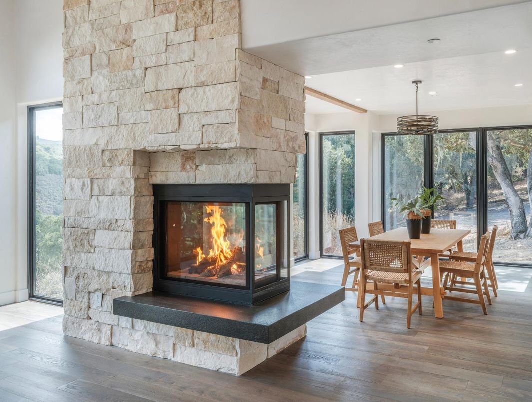 Dining room, Fireplace, Interior, Pendant Lights, Recessed Lighting, Stone Walls, Wood Texture Flooring