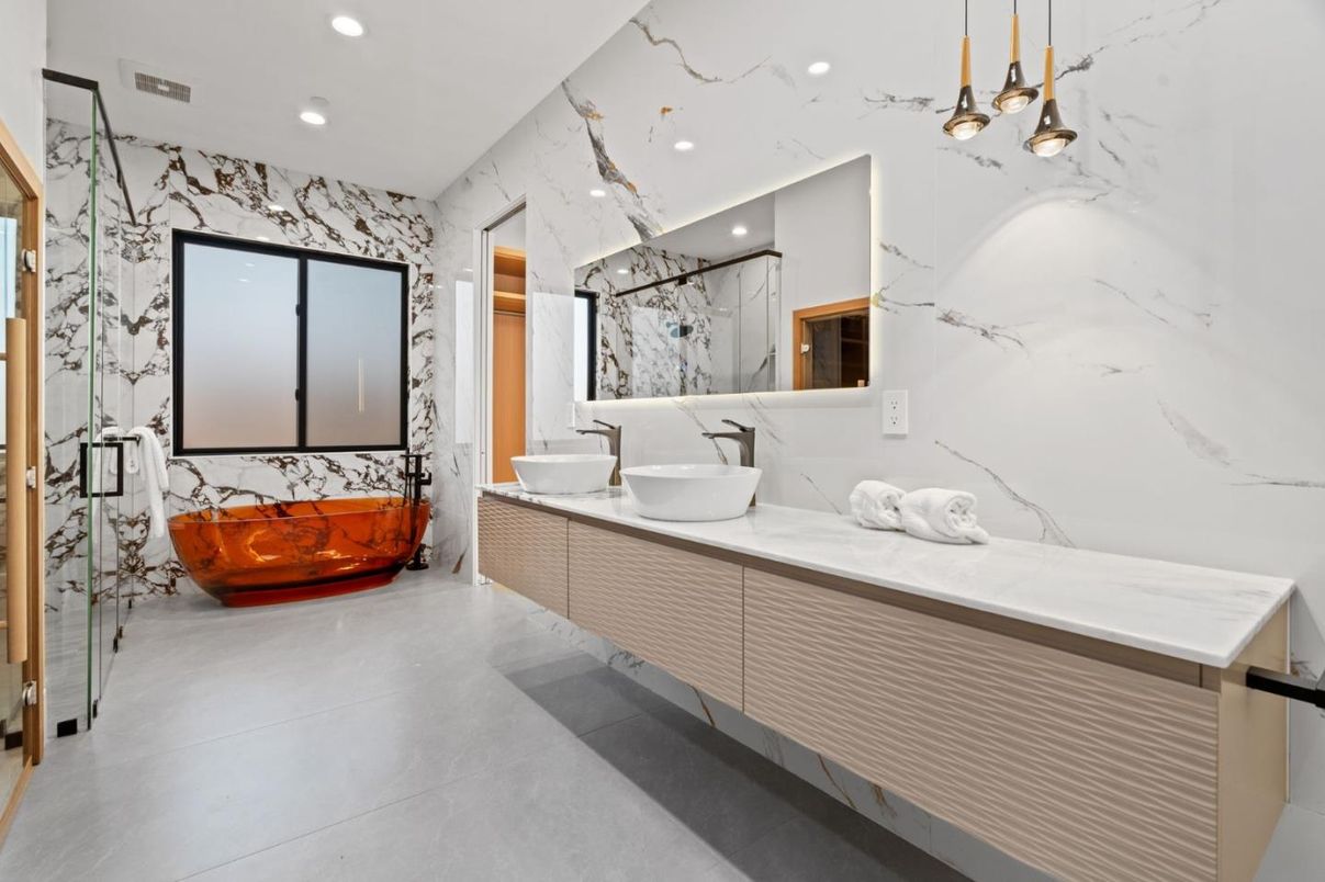 Bathroom, Dual Sink Vanities, Glass Shower, Interior, Marble Walls, Pendant Lights, Recessed Lighting