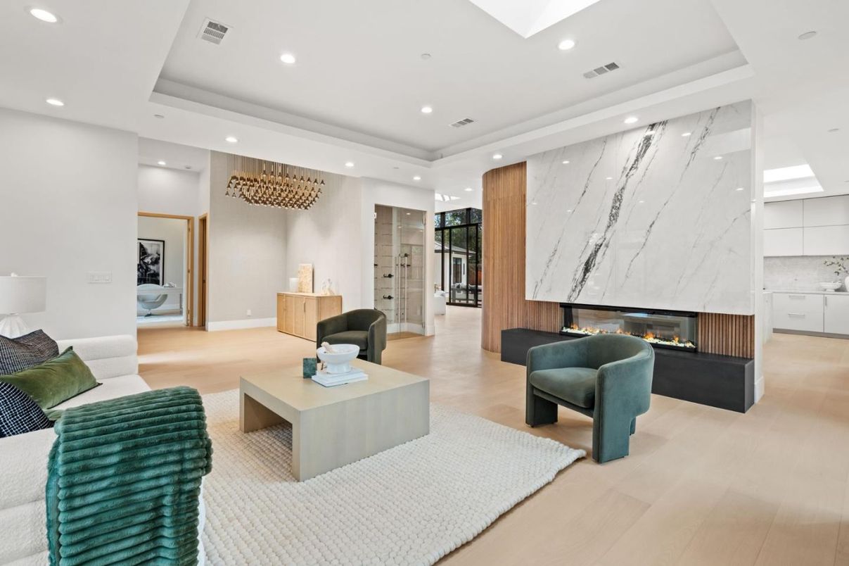 Fireplace, Interior, Living room, Marble Walls, Recessed Lighting, Wood Texture Flooring