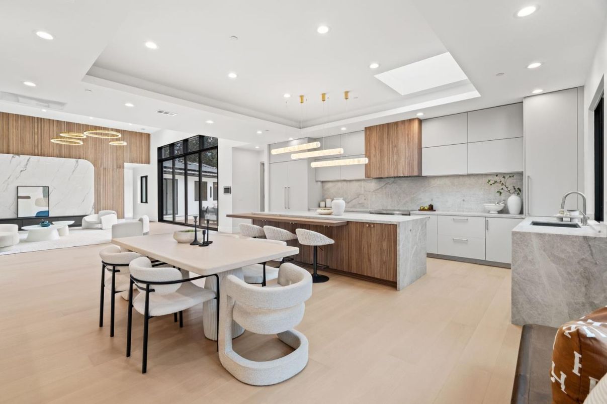 Dining room, Interior, Kitchen, Marble Walls, Pendant Lights, Recessed Lighting, Stainless Steel Appliances, Wood Texture Flooring