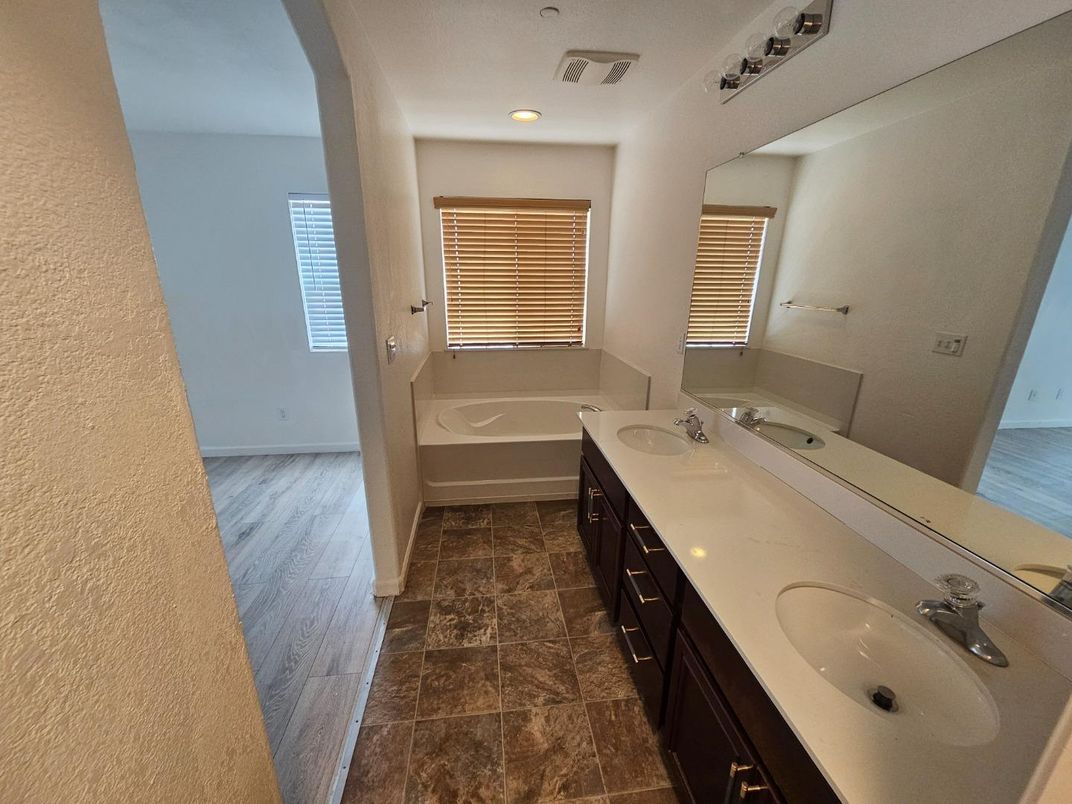 Bathroom, Dual Sink Vanities, Interior, Recessed Lighting, Wood Texture Flooring