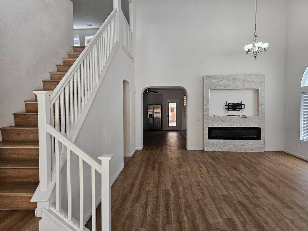 Chandelier, Fireplace, Interior, Wood Texture Flooring