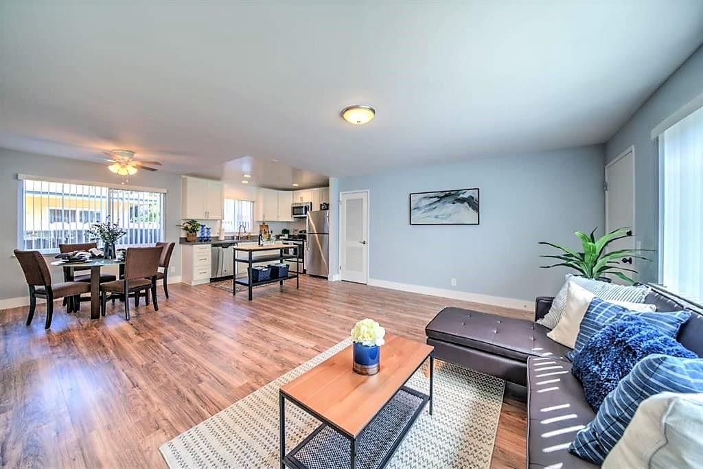Dining room, Interior, Kitchen, Living room, Recessed Lighting, Stainless Steel Appliances, Wood Texture Flooring