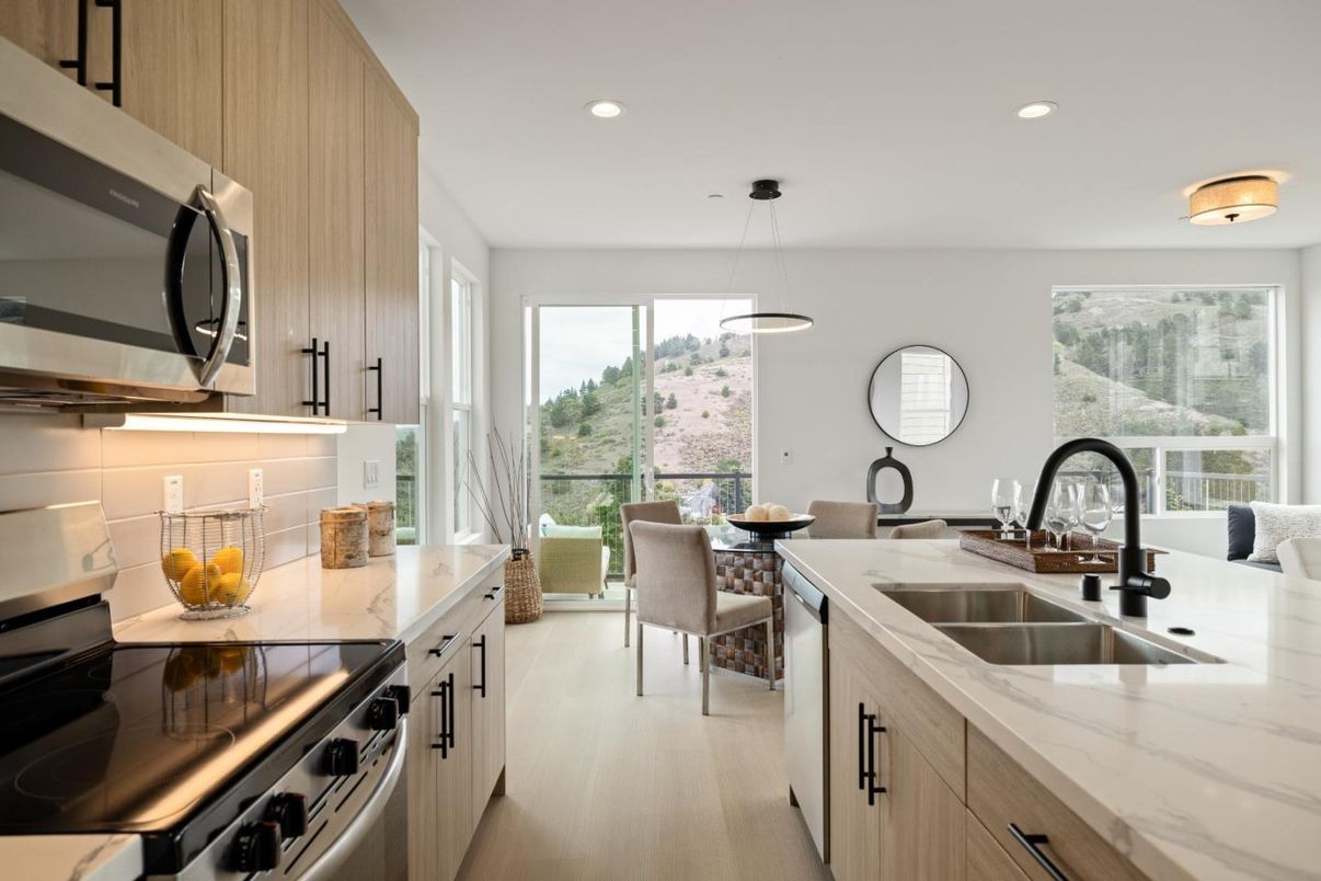 Dining room, Interior, Kitchen, Pendant Lights, Recessed Lighting, Stainless Steel Appliances, Wood Texture Flooring