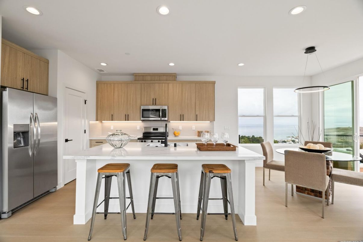 Dining room, Interior, Kitchen, Pendant Lights, Recessed Lighting, Stainless Steel Appliances, Water, Wood Texture Flooring