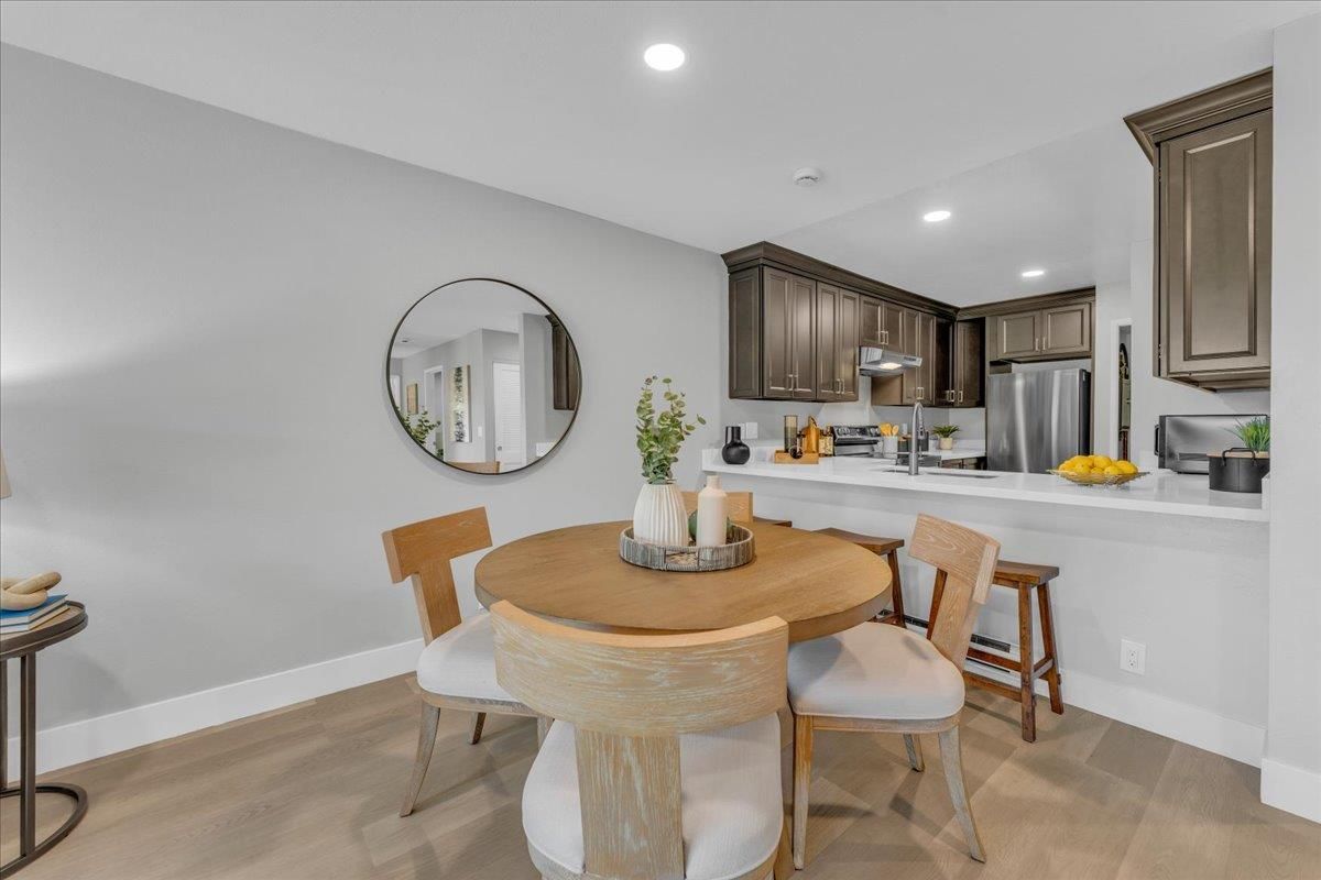 Dining room, Interior, Kitchen, Recessed Lighting, Stainless Steel Appliances, Wood Texture Flooring