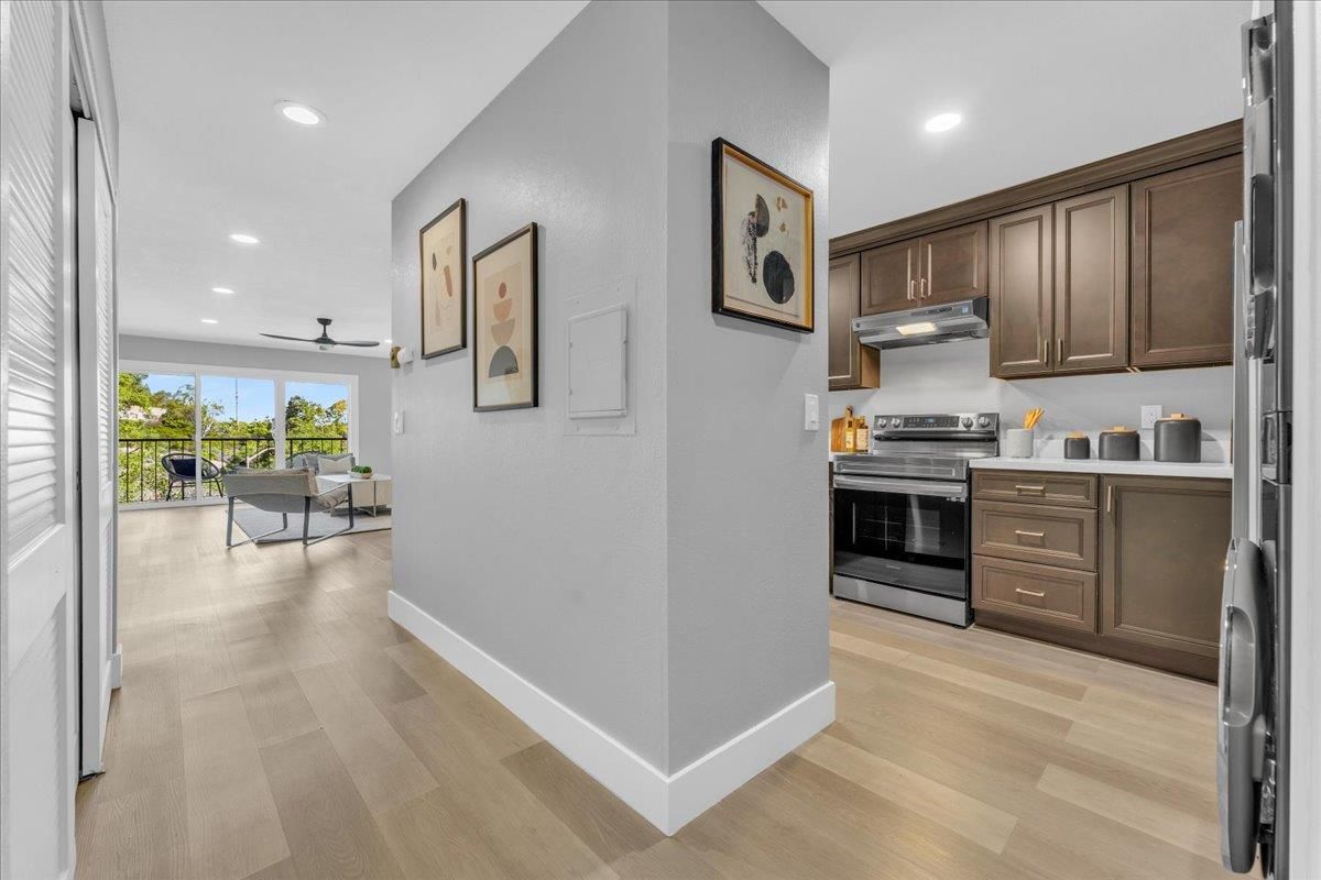 Interior, Kitchen, Recessed Lighting, Stainless Steel Appliances, Wood Texture Flooring