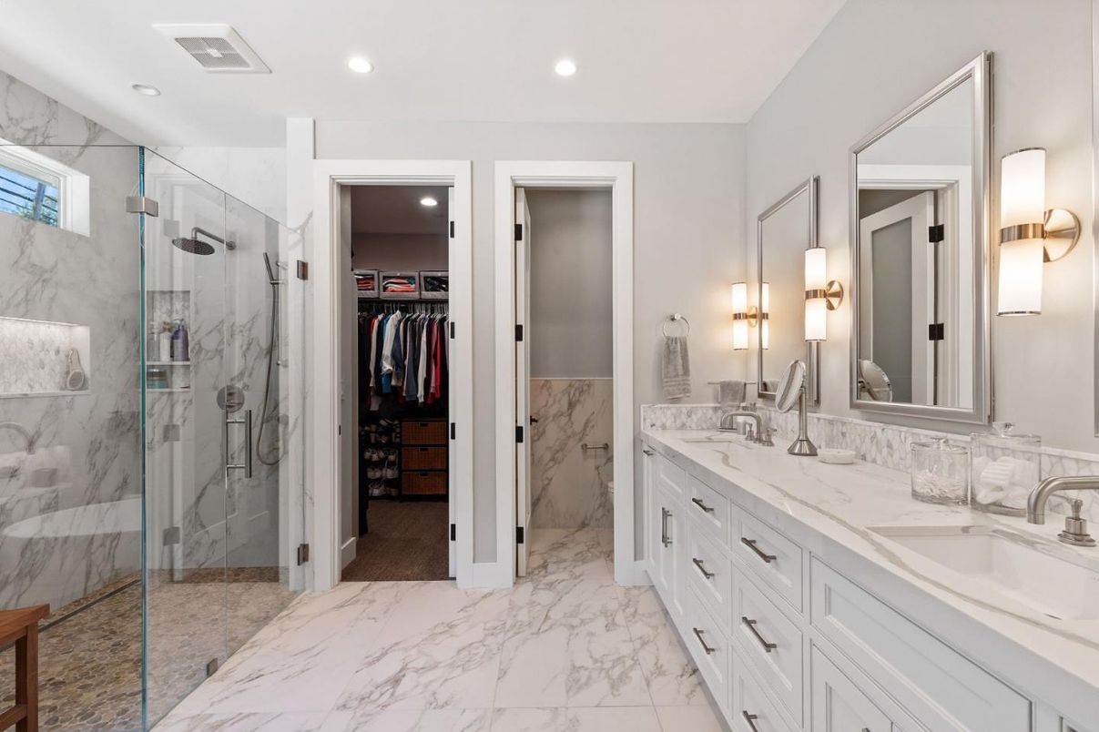 Bathroom, Dual Sink Vanities, Glass Shower, Interior, Marble, Marble Walls, Recessed Lighting, Walk-in Closets