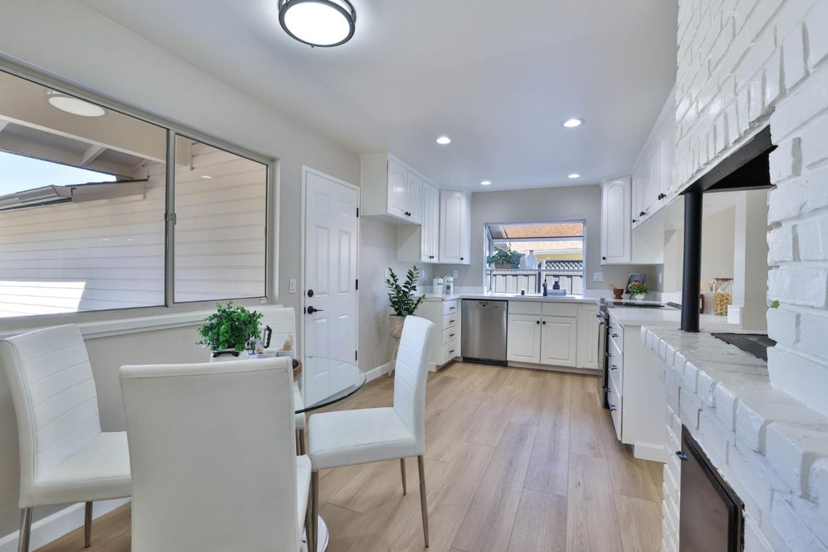 Dining room, Interior, Kitchen, Recessed Lighting, Stainless Steel Appliances, Wood Texture Flooring