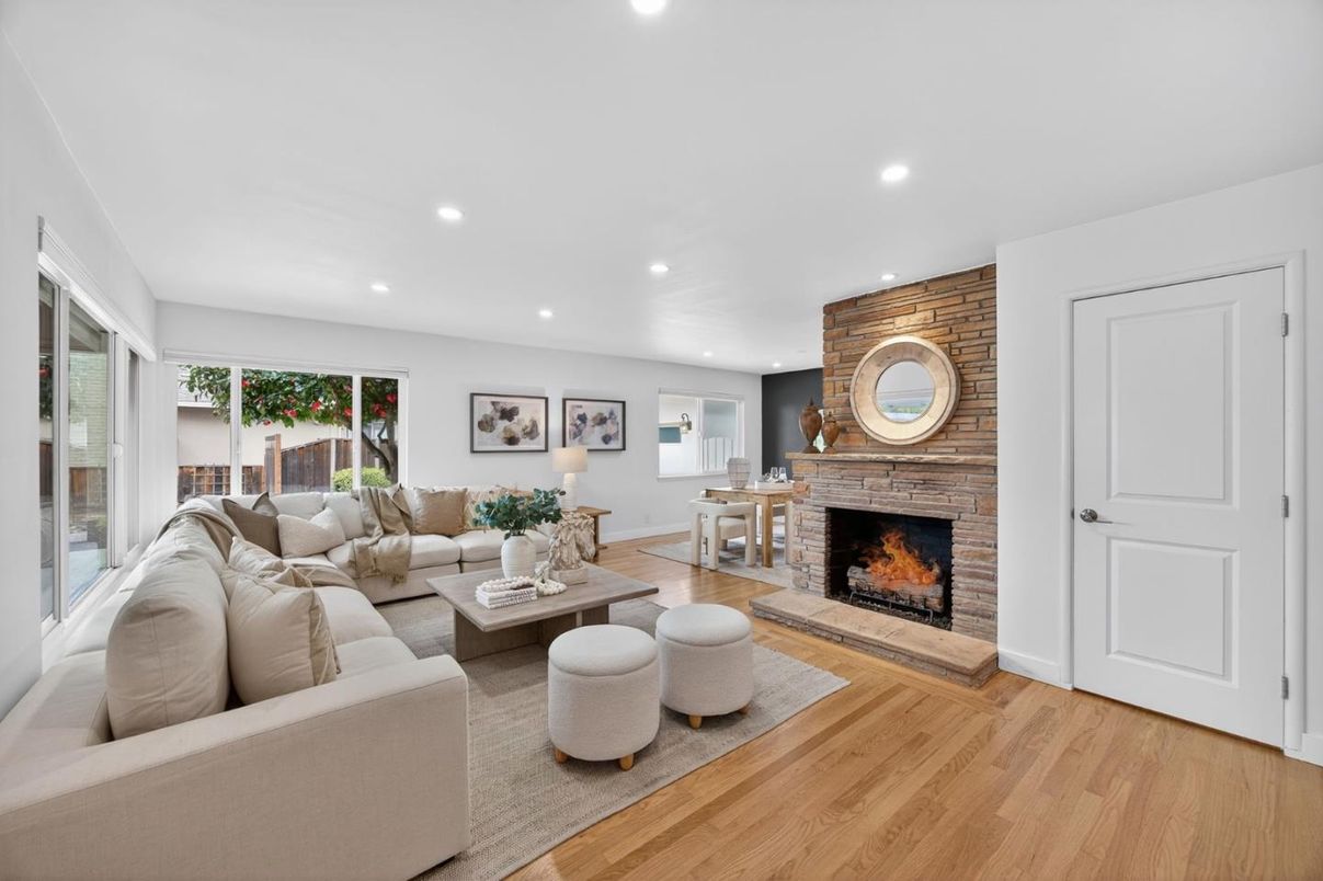 Fireplace, Interior, Living room, Recessed Lighting, Stone Walls, Wood Texture Flooring