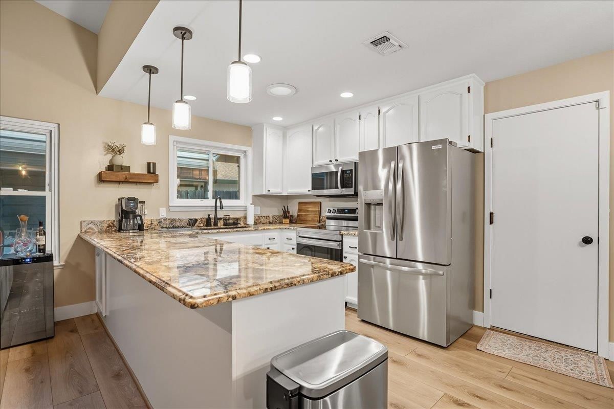 Interior, Kitchen, Pendant Lights, Recessed Lighting, Stainless Steel Appliances, Wood Texture Flooring