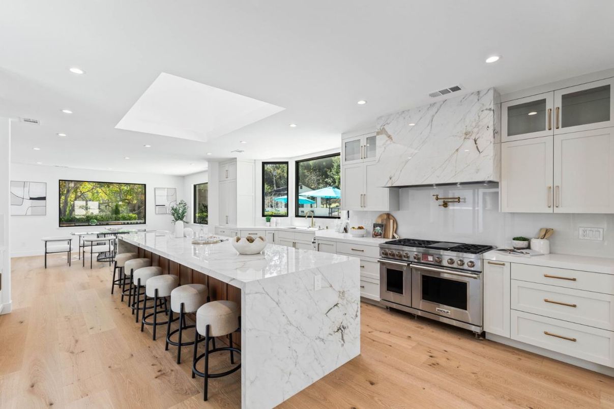 Interior, Kitchen, Marble Walls, Recessed Lighting, Stainless Steel Appliances, Wood Texture Flooring