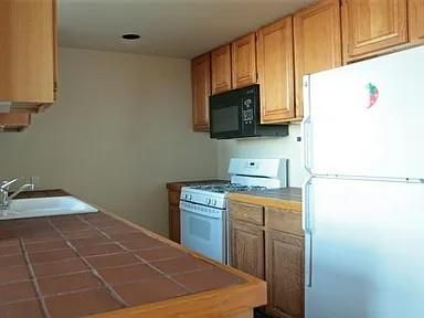Interior, Kitchen, Recessed Lighting, Tile Countertops