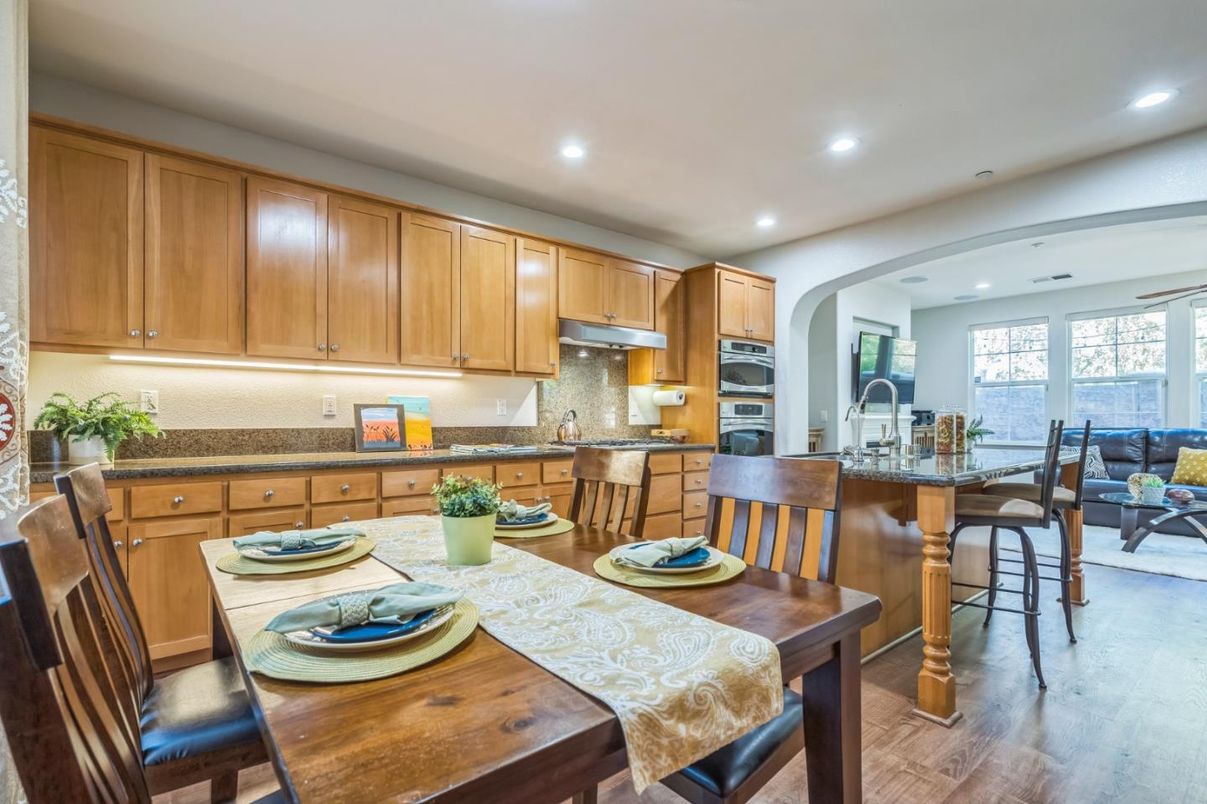 Dining room, Interior, Kitchen, Recessed Lighting, Stainless Steel Appliances, Wood Texture Flooring
