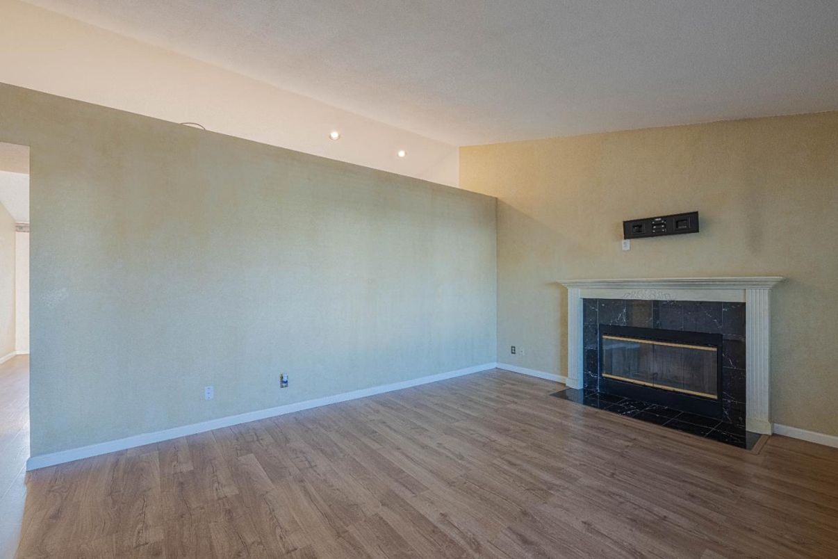 Empty room, Fireplace, Interior, Recessed Lighting, Wood Texture Flooring