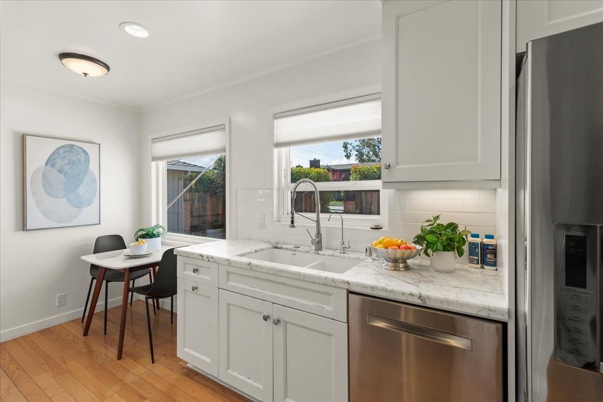Dining room, Interior, Kitchen, Recessed Lighting, Stainless Steel Appliances, Wood Texture Flooring