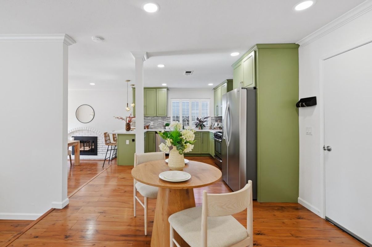 Dining room, Fireplace, Interior, Kitchen, Pendant Lights, Recessed Lighting, Stainless Steel Appliances, Wood Texture Flooring