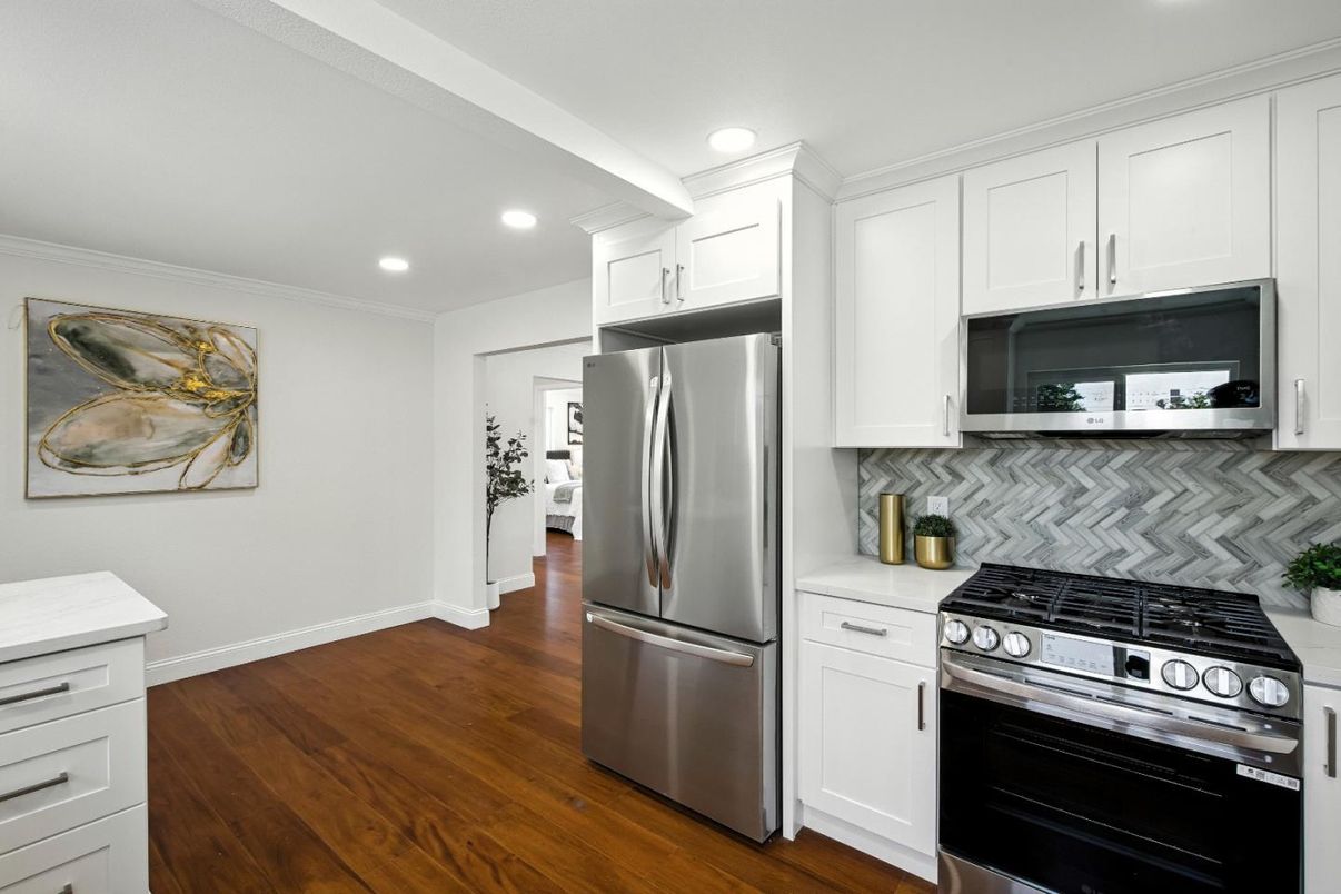 Interior, Kitchen, Recessed Lighting, Stainless Steel Appliances, Wood Texture Flooring