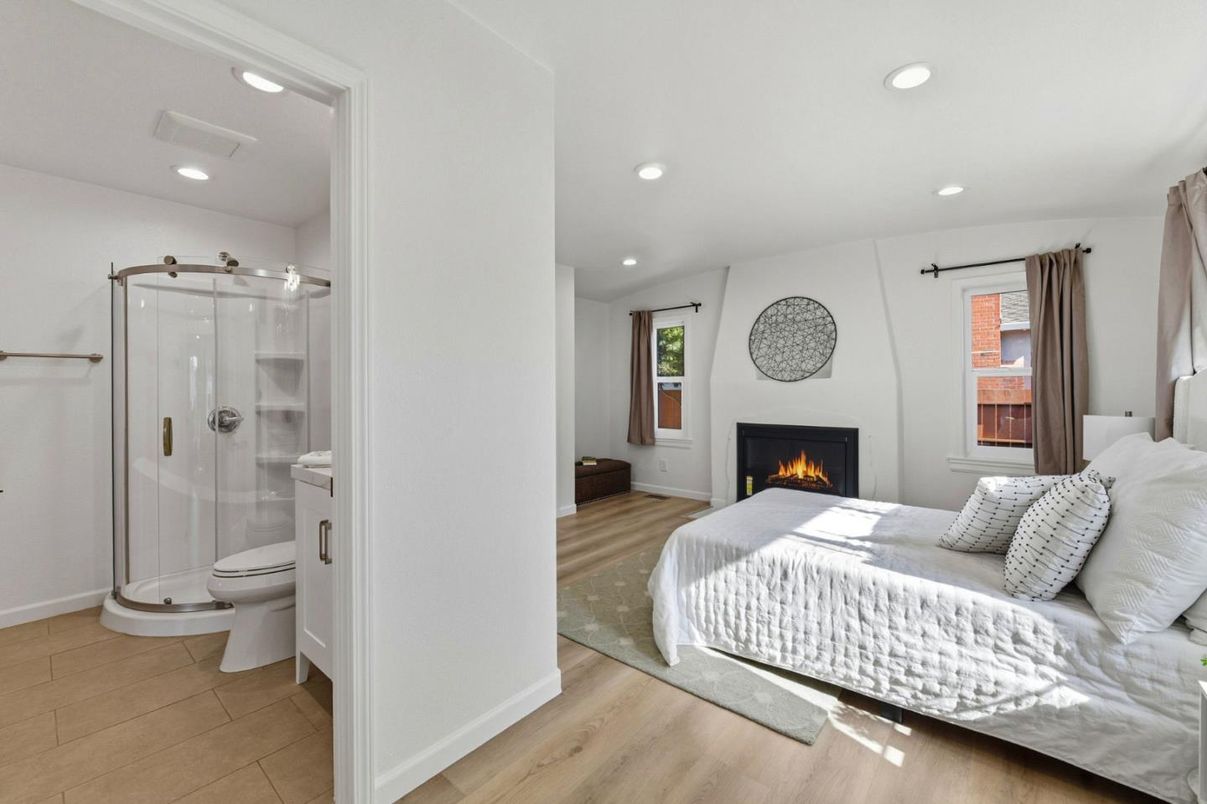 Bathroom, Bedroom, Fireplace, Glass Shower, Interior, Recessed Lighting, Wood Texture Flooring