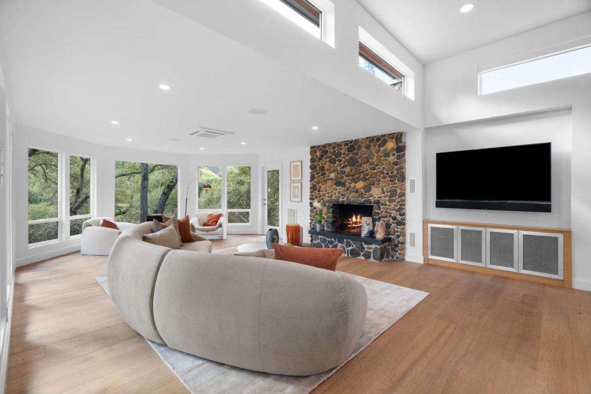 Fireplace, Interior, Living room, Recessed Lighting, Stone Walls, Wood Texture Flooring