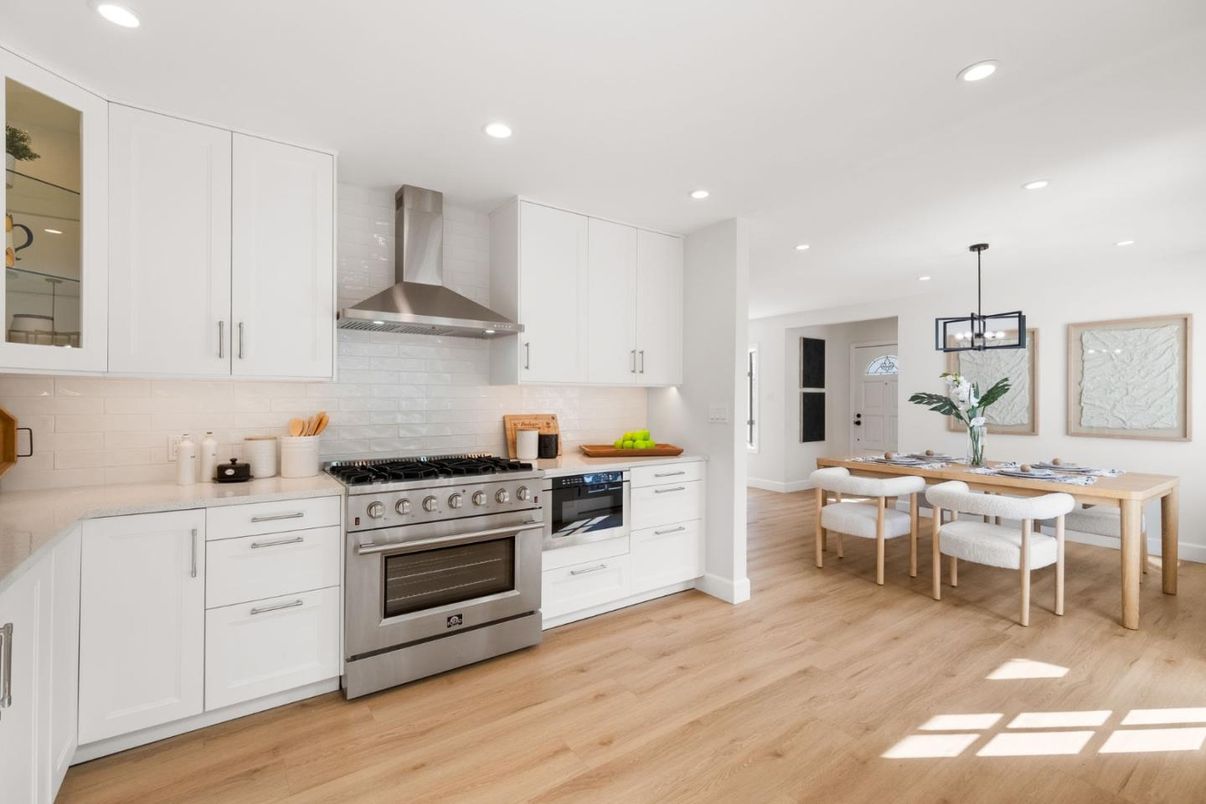 Dining room, Interior, Kitchen, Pendant Lights, Recessed Lighting, Stainless Steel Appliances, Wood Texture Flooring