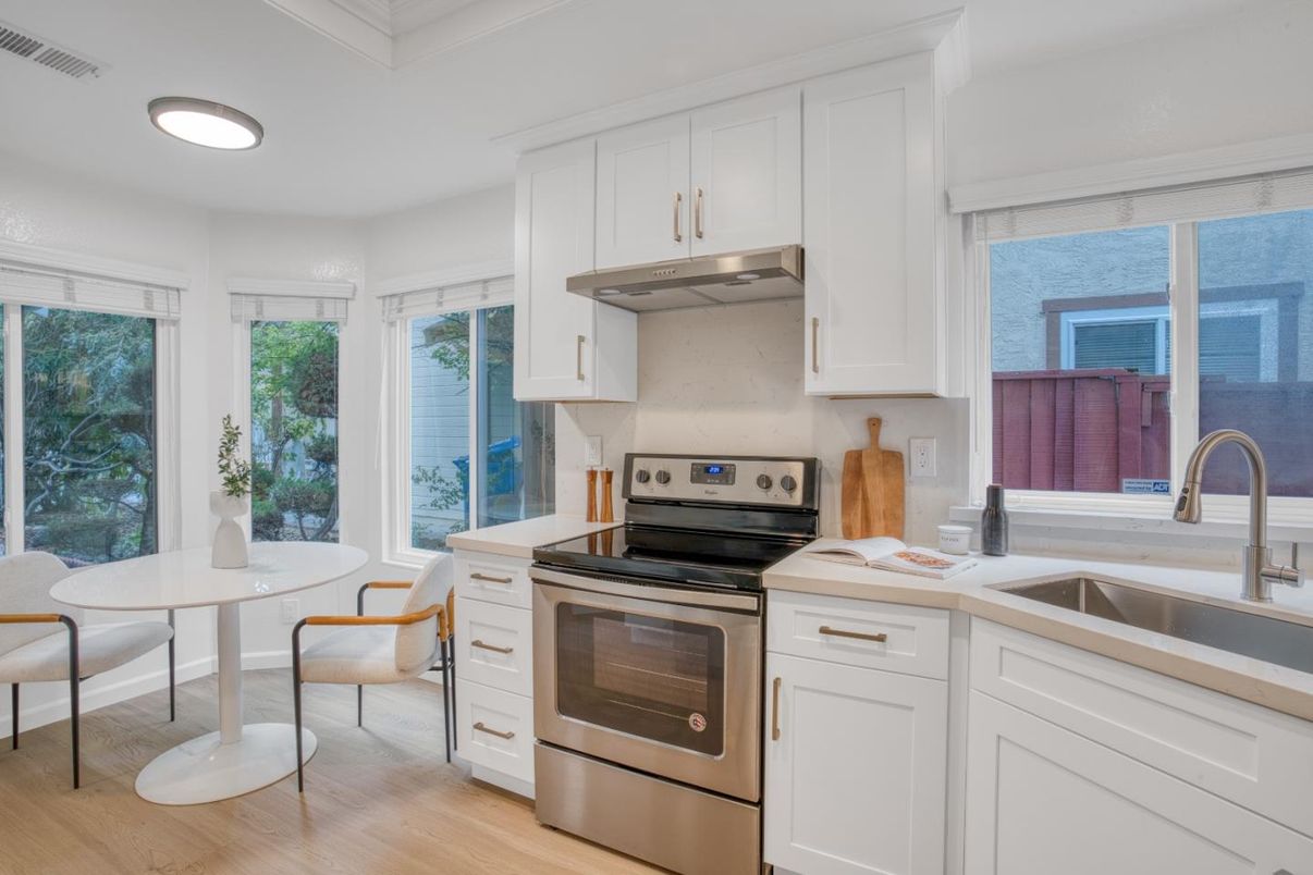 Dining room, Interior, Kitchen, Recessed Lighting, Stainless Steel Appliances, Wood Texture Flooring