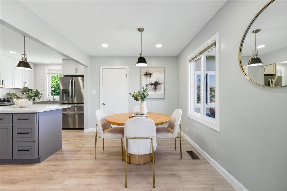 Dining room, Interior, Kitchen, Pendant Lights, Recessed Lighting, Stainless Steel Appliances, Wood Texture Flooring