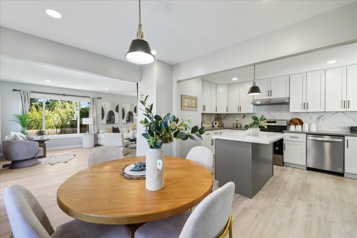 Dining room, Interior, Kitchen, Pendant Lights, Recessed Lighting, Stainless Steel Appliances, Wood Texture Flooring