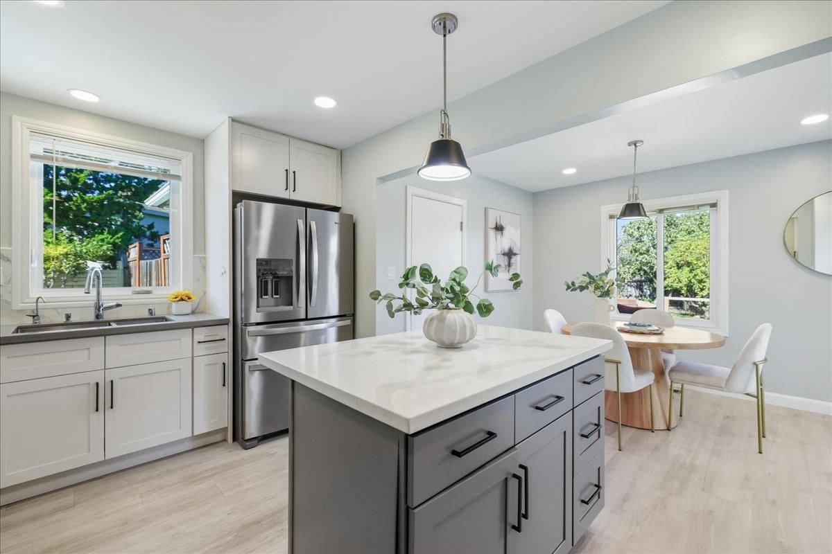 Dining room, Interior, Kitchen, Pendant Lights, Recessed Lighting, Stainless Steel Appliances, Wood Texture Flooring