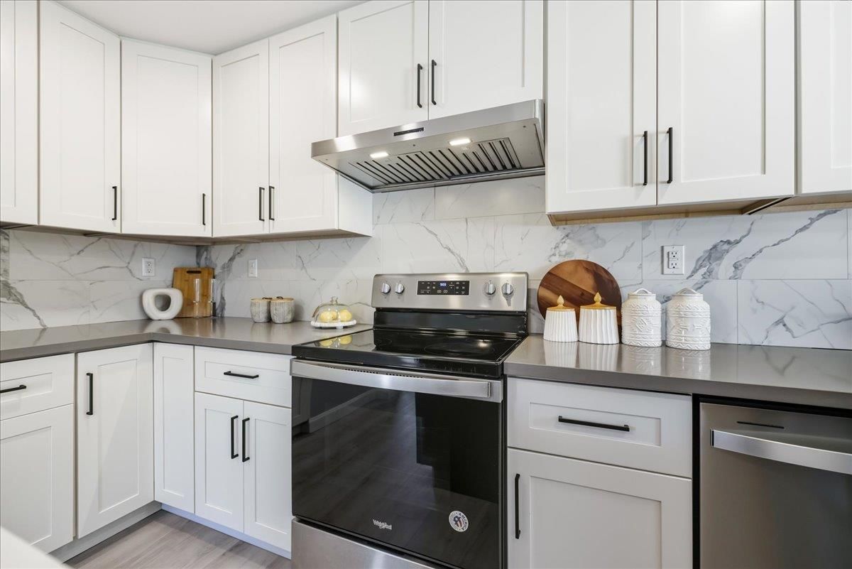 Interior, Kitchen, Marble Walls, Stainless Steel Appliances, Wood Texture Flooring