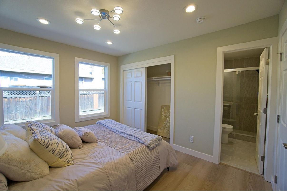 Bathroom, Bedroom, Glass Shower, Interior, Recessed Lighting, Wood Texture Flooring