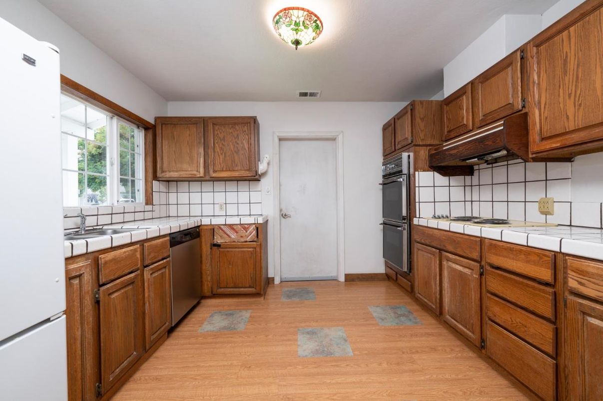Interior, Kitchen, Tile Countertops, Wood Texture Flooring