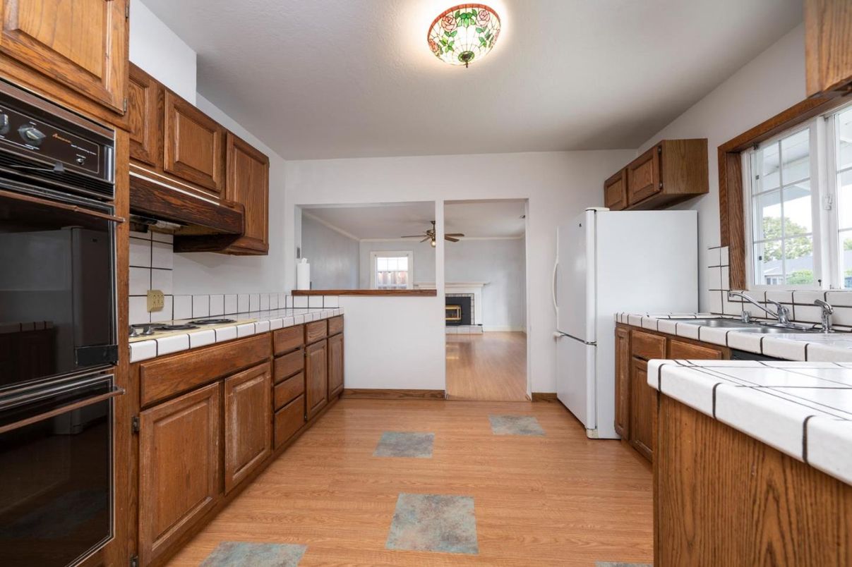 Interior, Kitchen, Tile Countertops, Wood Texture Flooring