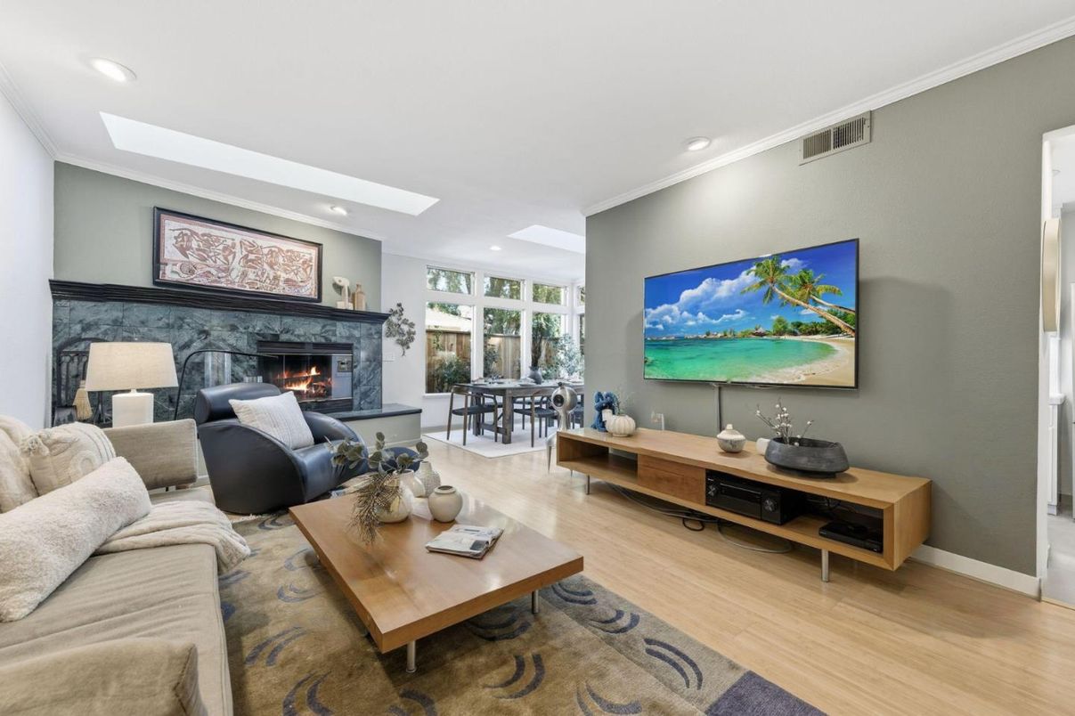 Dining room, Fireplace, Interior, Living room, Recessed Lighting, Wood Texture Flooring