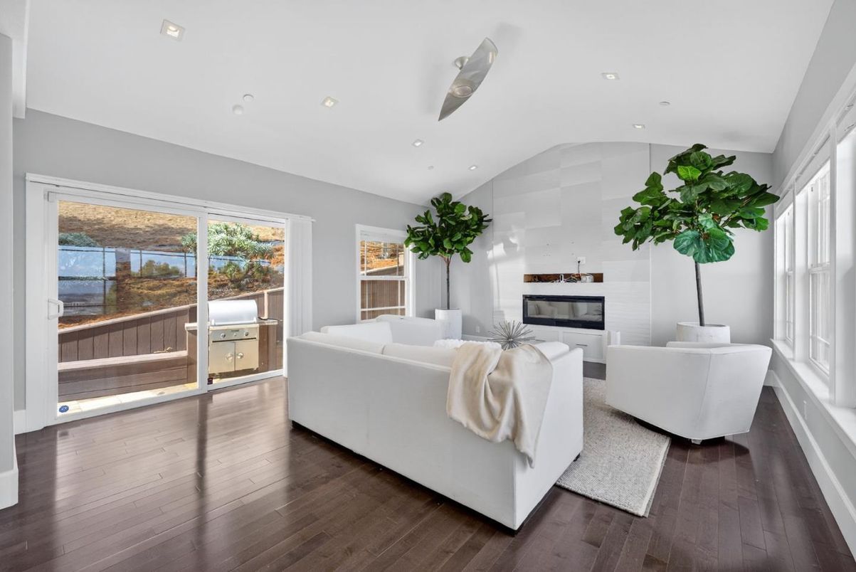 Fireplace, Interior, Living room, Recessed Lighting, Water, Wood Texture Flooring