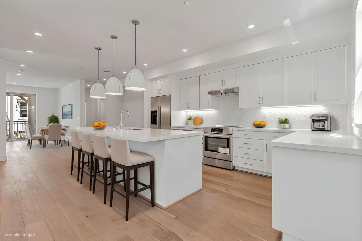 Dining room, Interior, Kitchen, Pendant Lights, Recessed Lighting, Stainless Steel Appliances, Wood Texture Flooring