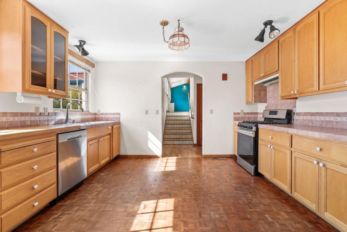 Interior, Kitchen, Stainless Steel Appliances, Tile Countertops, Wood Texture Flooring