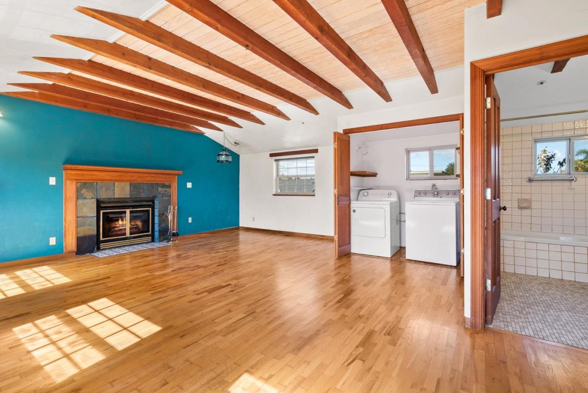 Empty room, Fireplace, Interior, Washer, Wooden Beams, Wooden Ceilings, Wood Texture Flooring