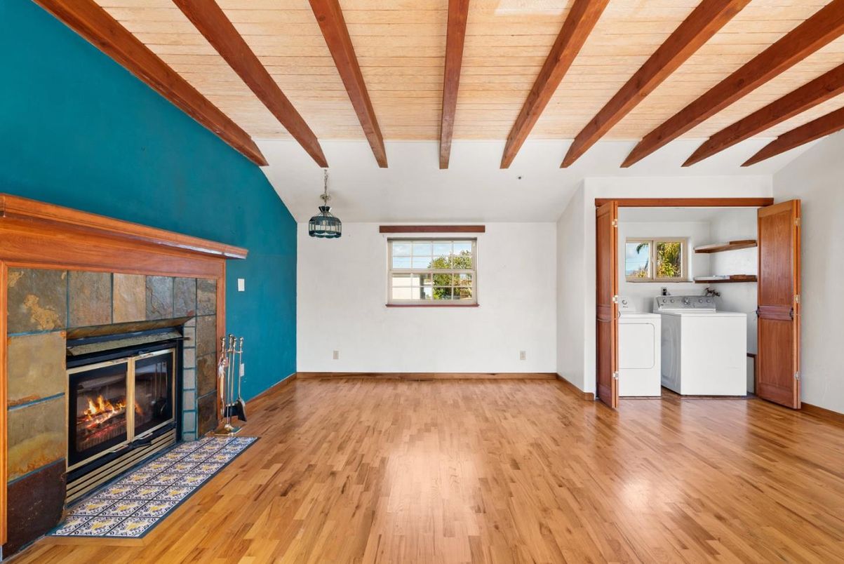 Empty room, Fireplace, Interior, Pendant Lights, Washer, Wooden Beams, Wooden Ceilings, Wood Texture Flooring