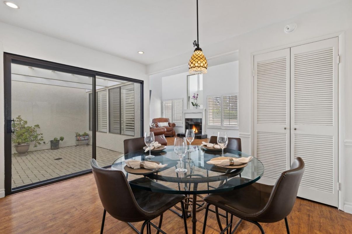 Dining room, Fireplace, Interior, Pendant Lights, Recessed Lighting, Wood Texture Flooring