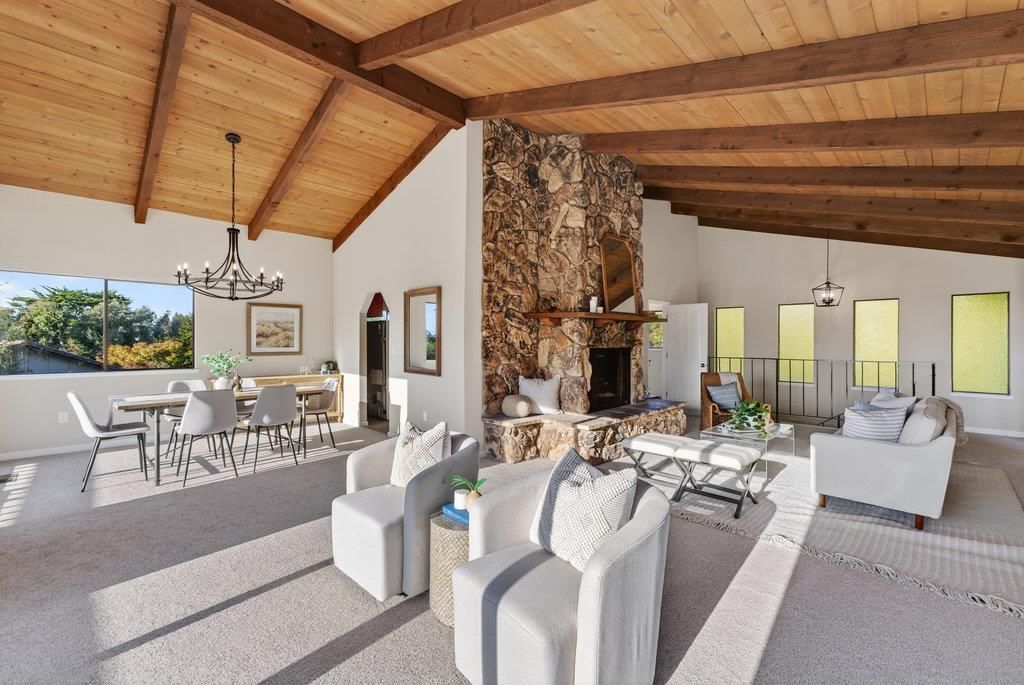 Chandelier, Dining room, Fireplace, Interior, Living room, Pendant Lights, Stone Walls, Wooden Beams, Wooden Ceilings