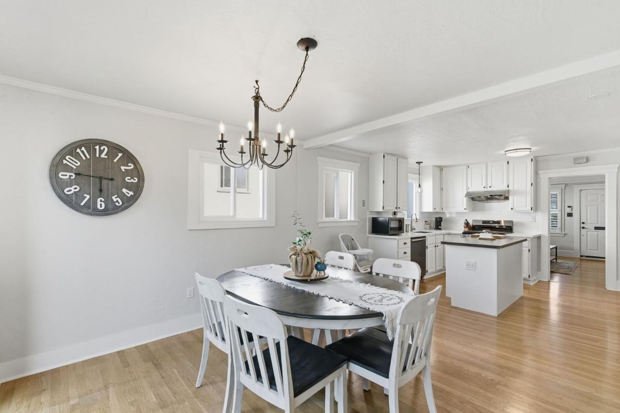 Chandelier, Dining room, Interior, Kitchen, Pendant Lights, Stainless Steel Appliances, Wood Texture Flooring