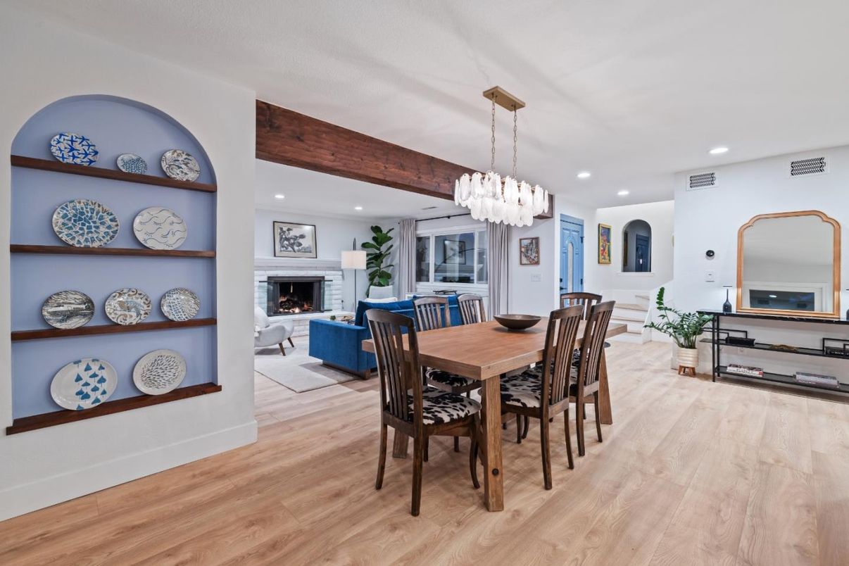 Chandelier, Dining room, Fireplace, Interior, Living room, Pendant Lights, Recessed Lighting, Wooden Beams, Wood Texture Flooring