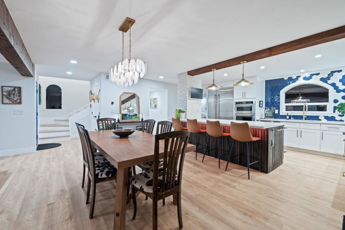 Chandelier, Dining room, Interior, Kitchen, Pendant Lights, Recessed Lighting, Stainless Steel Appliances, Wooden Beams, Wood Texture Flooring